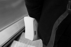 The Infinite Jest by David Foster Wallace (Spotted On An Escalator) • <a style="font-size:0.8em;" href="http://www.flickr.com/photos/81015582@N06/7617593896/" target="_blank">View on Flickr</a>